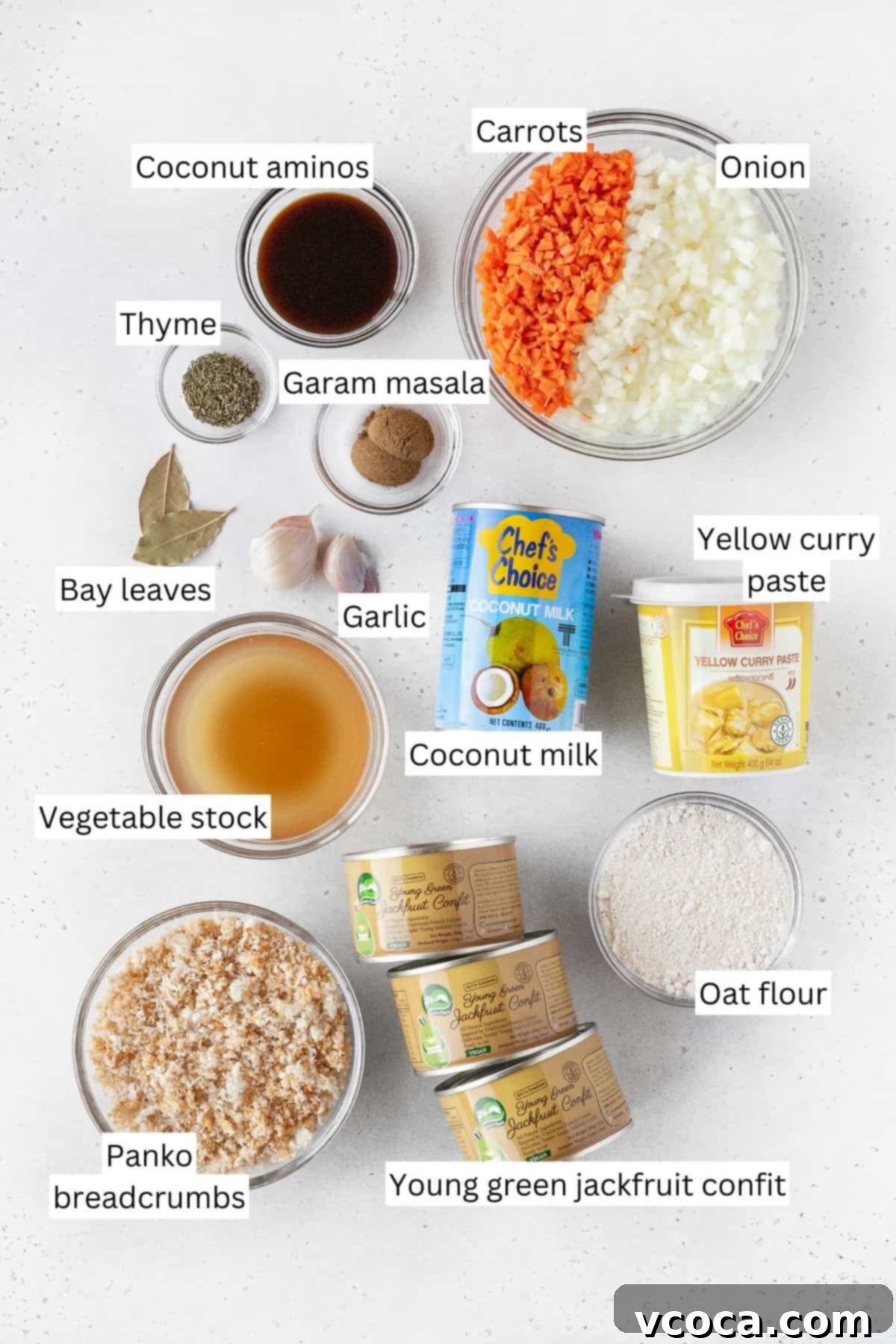 Ingredients for making Japanese vegan katsu curry laid out on a white surface with text overlay.