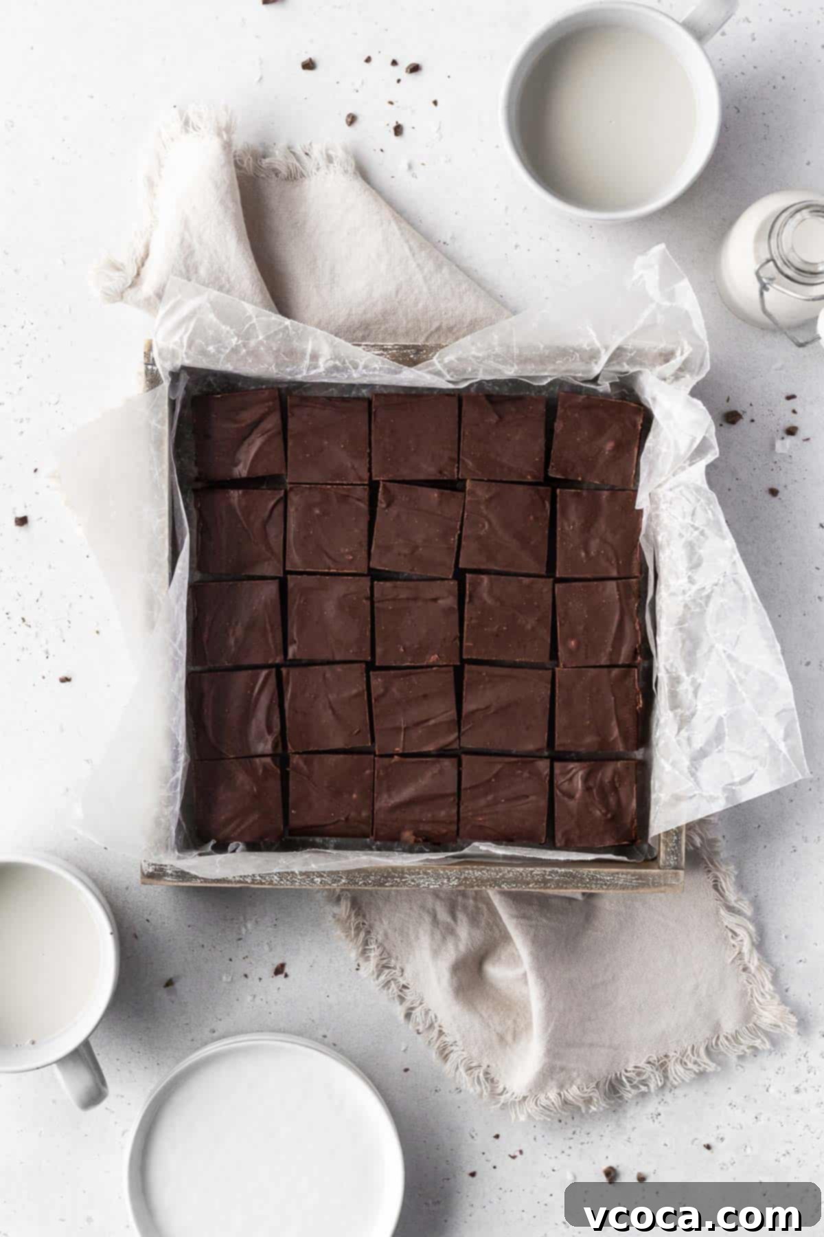 Plant-Based Fudge 4 Overhead shot of square baking tin with a batch of dairy-free fudge cut into 20 squares.