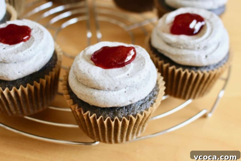 Spooky Black Sesame Eyeball Cupcakes 6 Frosted black sesame cupcakes with a dollop of