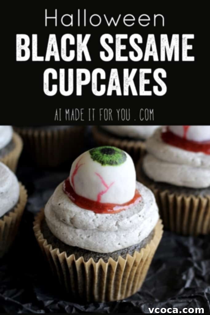 Spooky Black Sesame Eyeball Cupcakes 10 A stunning vertical shot of Halloween black sesame cupcakes with white chocolate eyeballs, perfect for an adult Halloween party.