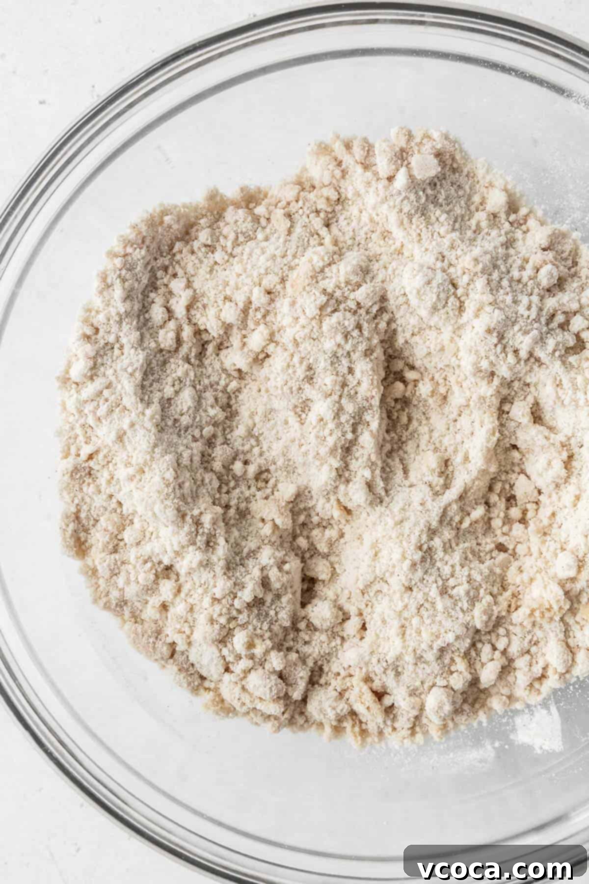 Wholesome Plant-Based Baked Donuts 6 Close-up on dry ingredients after whisking with vegan butter.