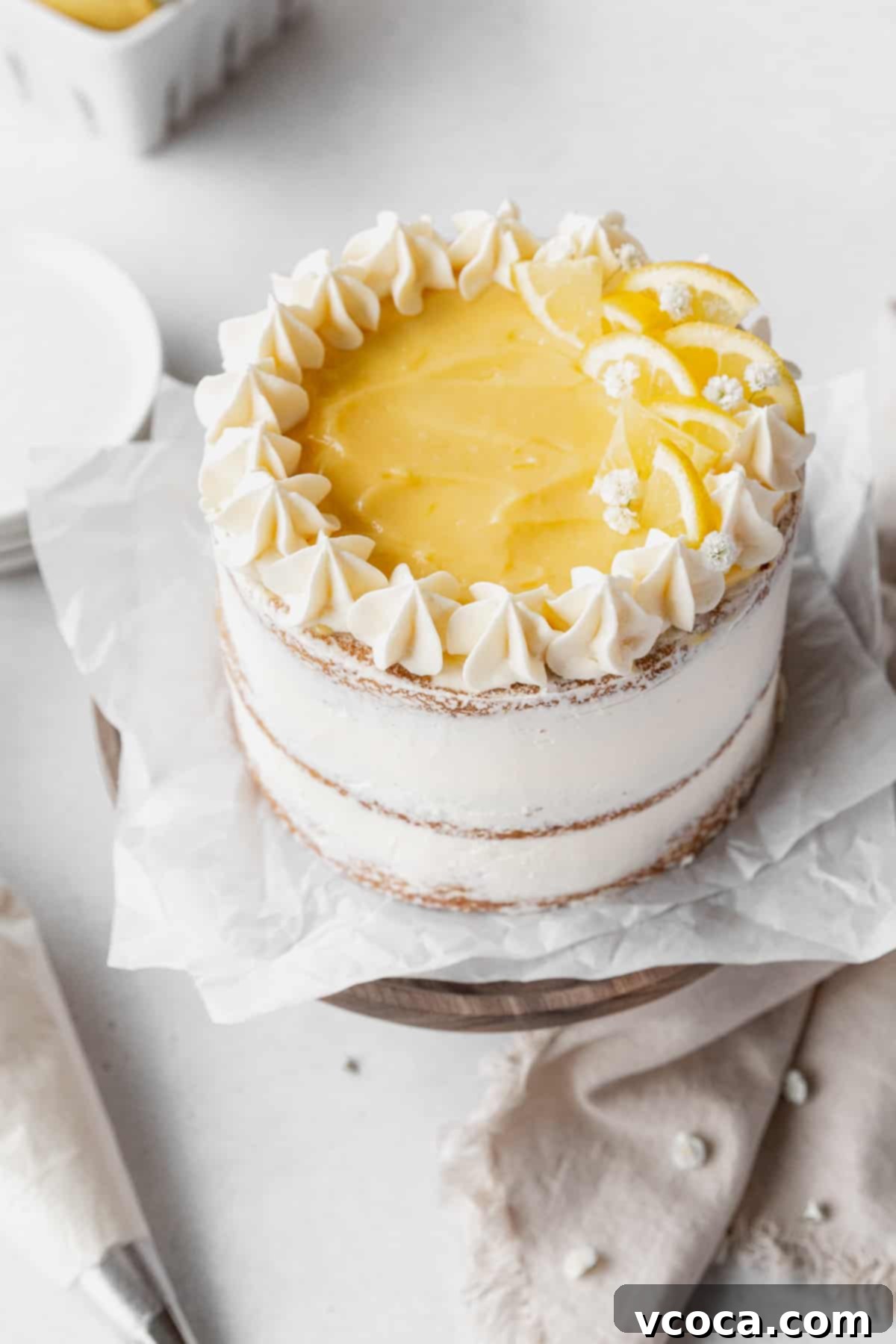 Luscious Lemon Curd Cake 3 45 degree angle shot showing the top of the decorated dairy-free lemon curd cake.