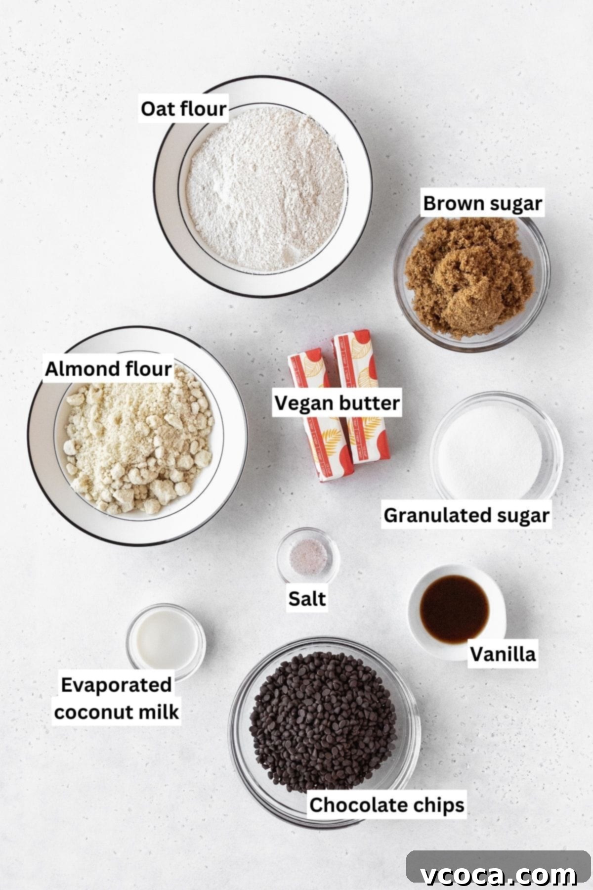 No-Bake Gluten-Free Cookie Dough 3 Ingredients needed to make gluten-free edible sugar cookie dough measured out on a white table.