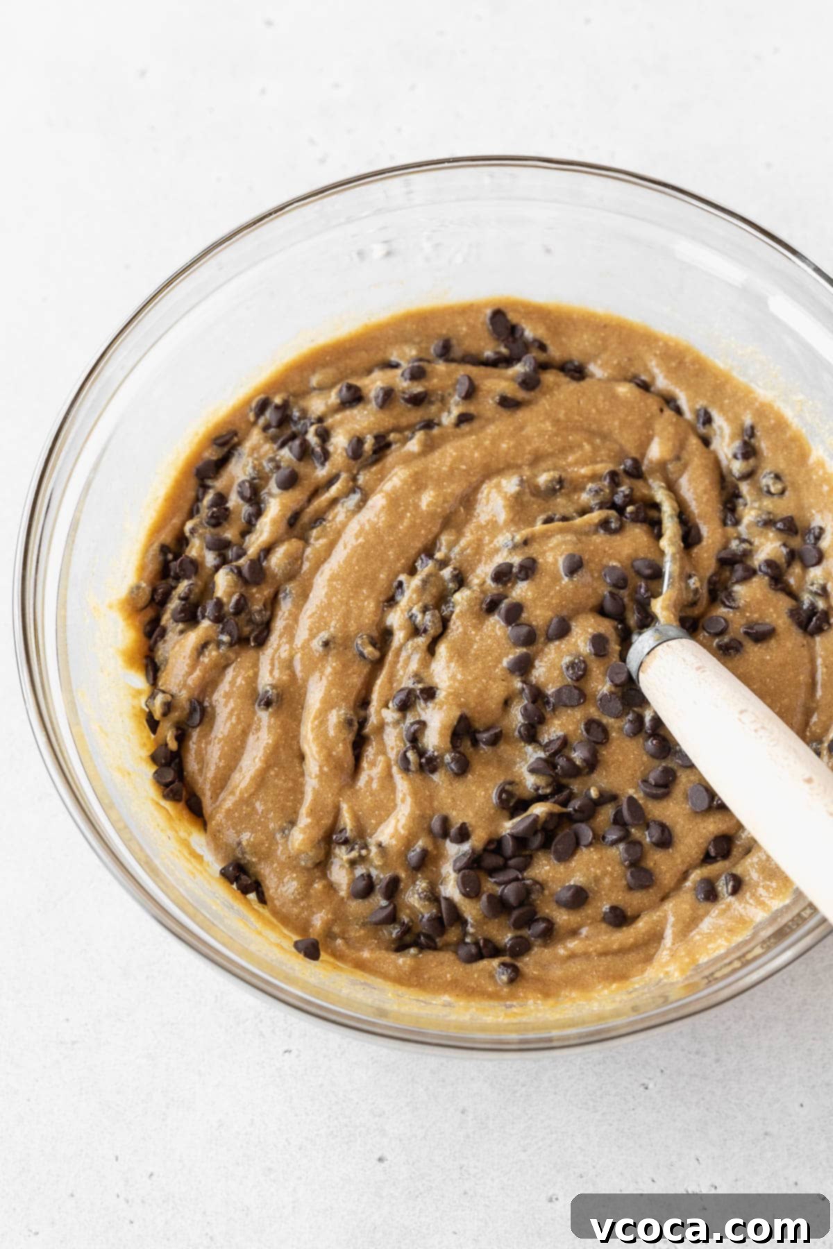 No-Bake Gluten-Free Cookie Dough 9 Step 3 for making gluten-free edible cookie dough — whisking in mini chocolate chips.