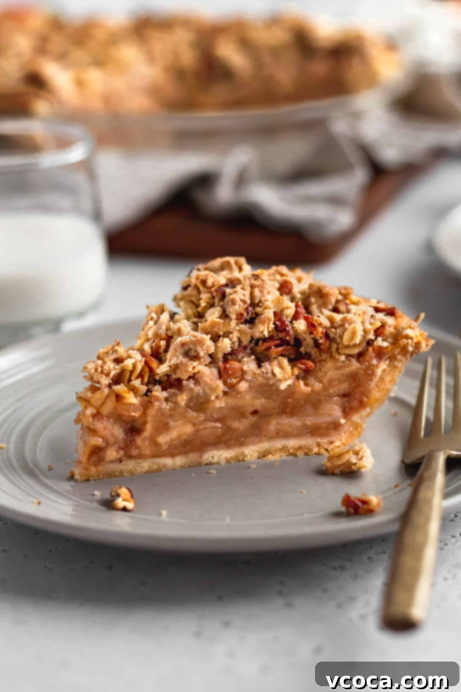 Gluten Free Dutch Apple Crumble Pie 7 A slice of gluten-free apple crumble pie, showcasing the fluffy streusel and tender apple filling