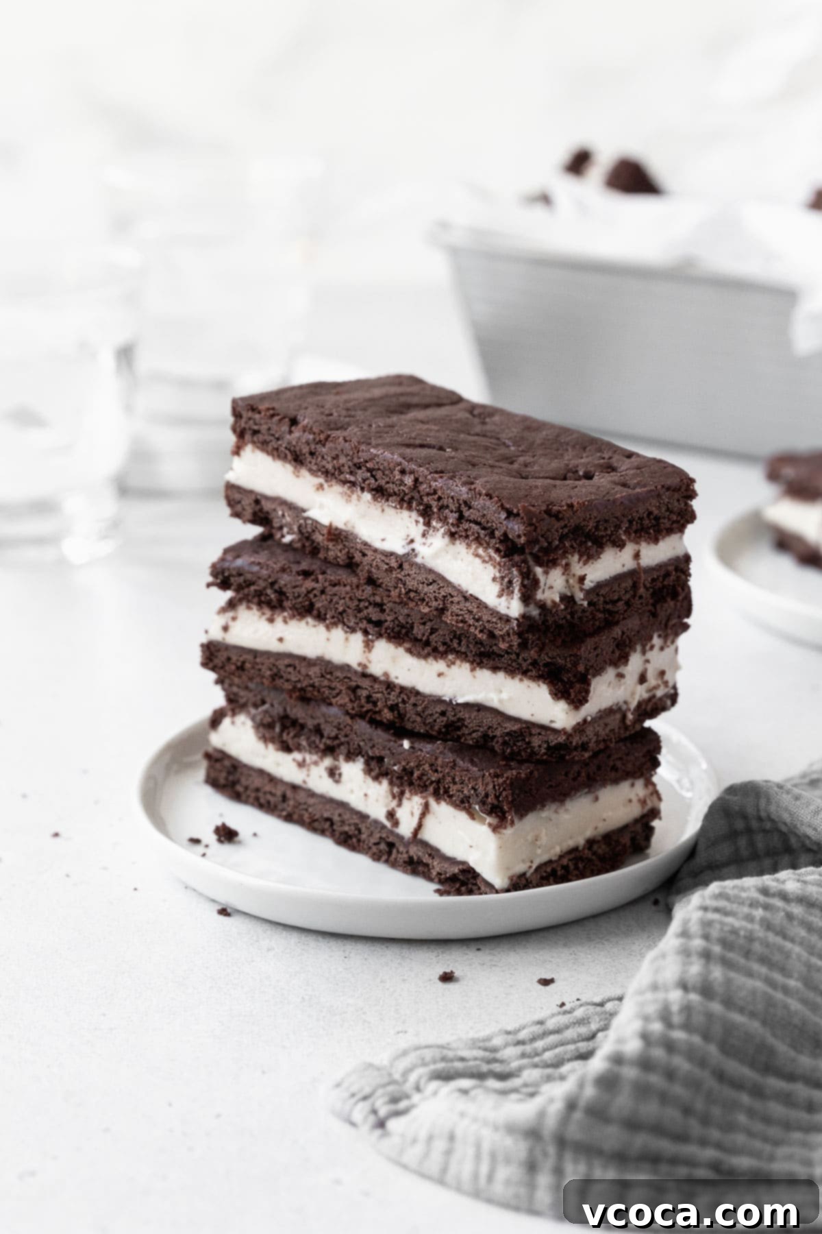Guilt-Free Frozen Indulgence 2 A stack of gluten-free ice cream sandwich cookies on a white dish.