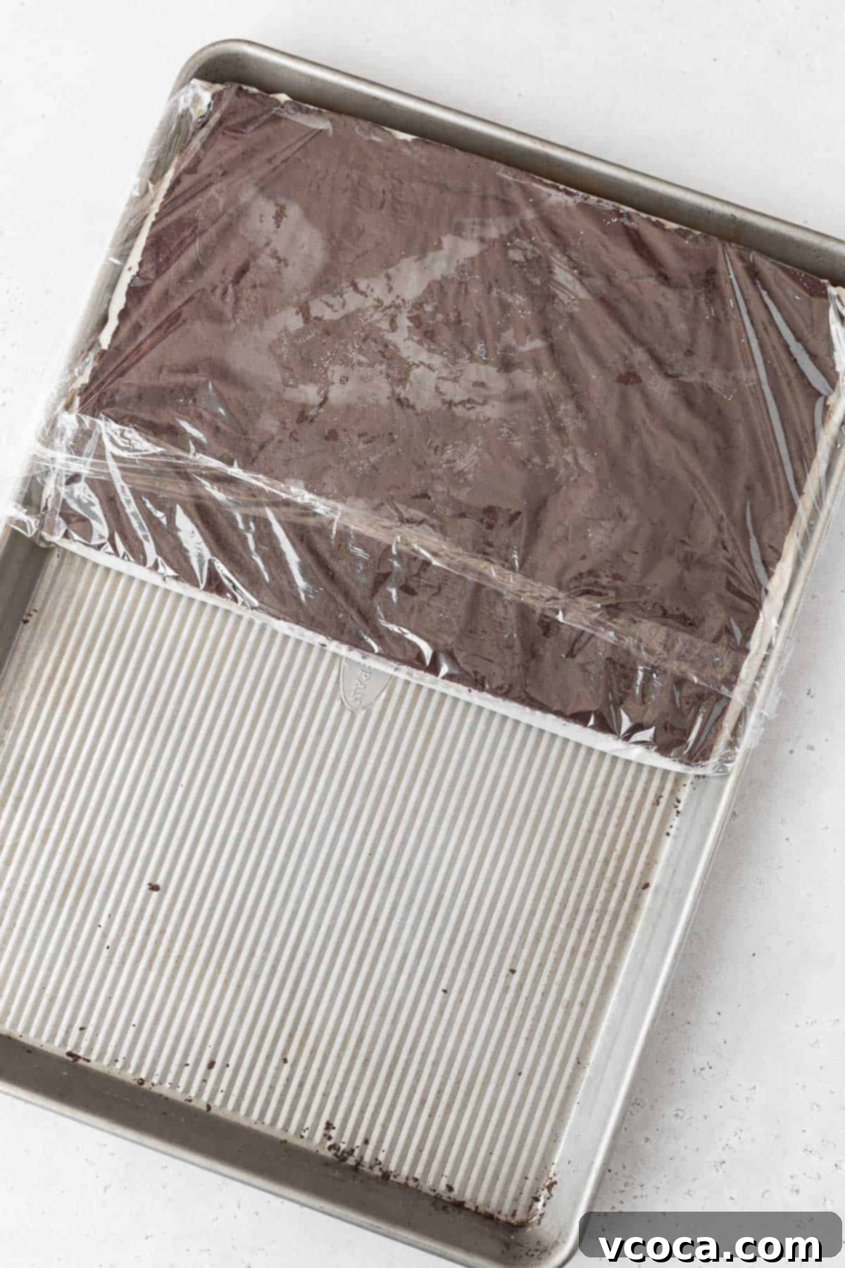Guilt-Free Frozen Indulgence 14 Stacking the gluten-free ice cream sandwich cookie together on a large cookie sheet.