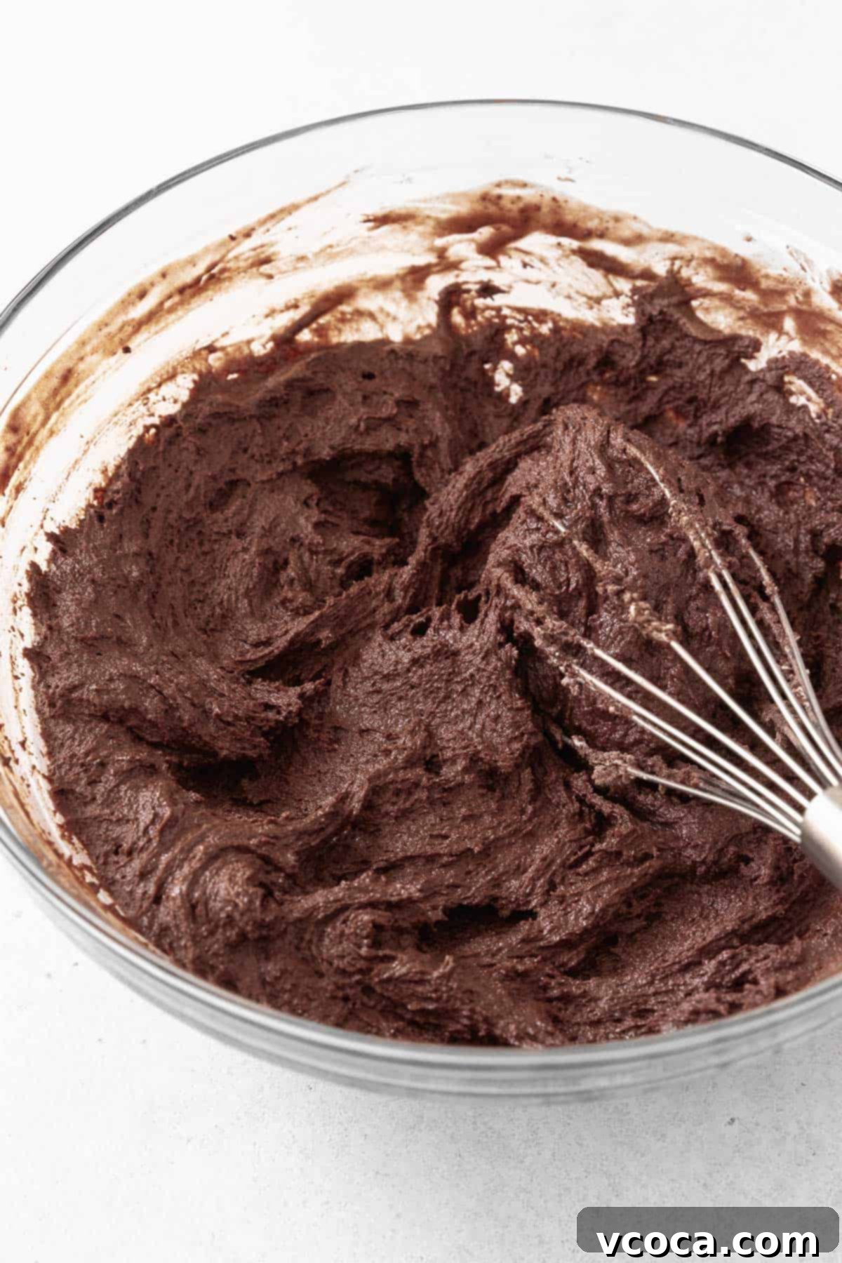 Guilt-Free Frozen Indulgence 7 The chocolate sandwich cookie batter in a glass mixing bowl.