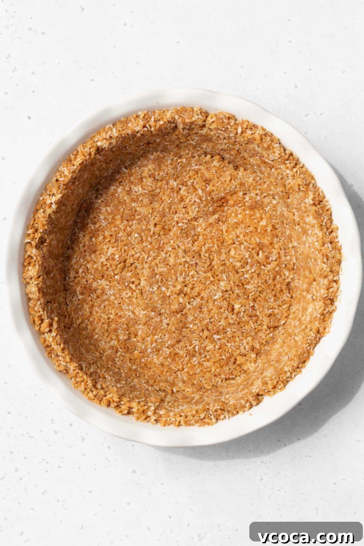 Divine Vegan Coconut Cream Pie Gluten Free 7 Gluten-free coconut pie crust after pressing into the pie pan.