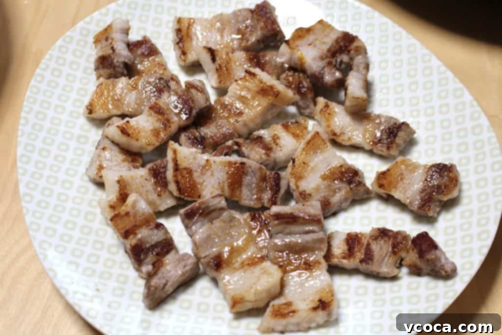 Grilled pork belly and vegetables with perfect char.