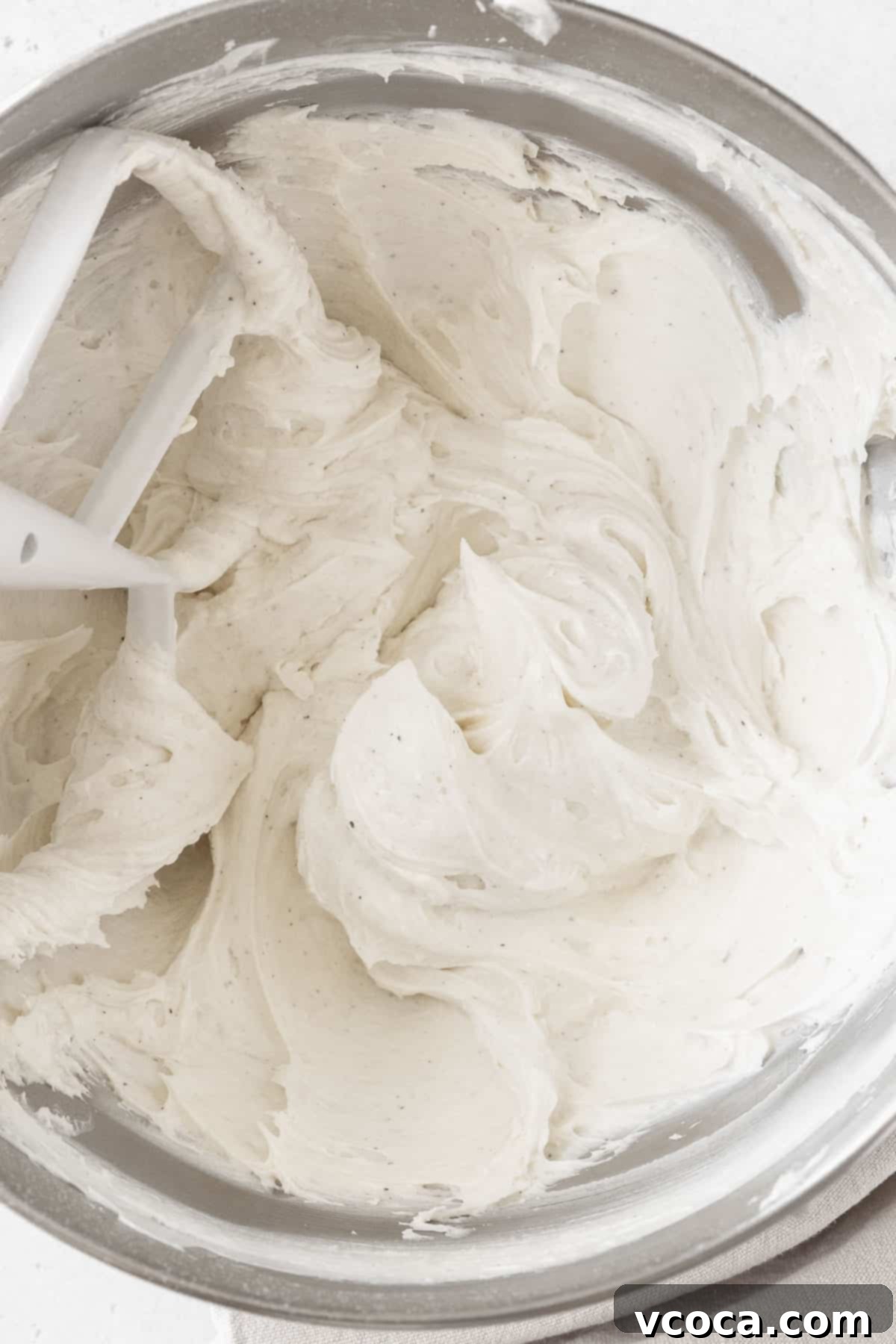 Velvety Vegan Buttercream 7 An overhead shot of a mixing bowl of the dairy free buttercream.