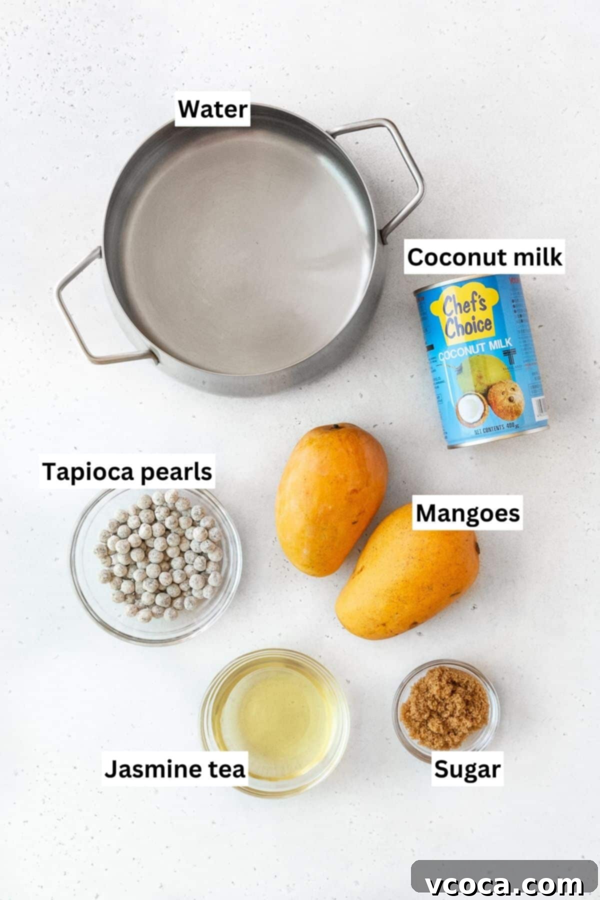 Tropical Mango Boba 3 All of the ingredients for mango boba tea on the counter.