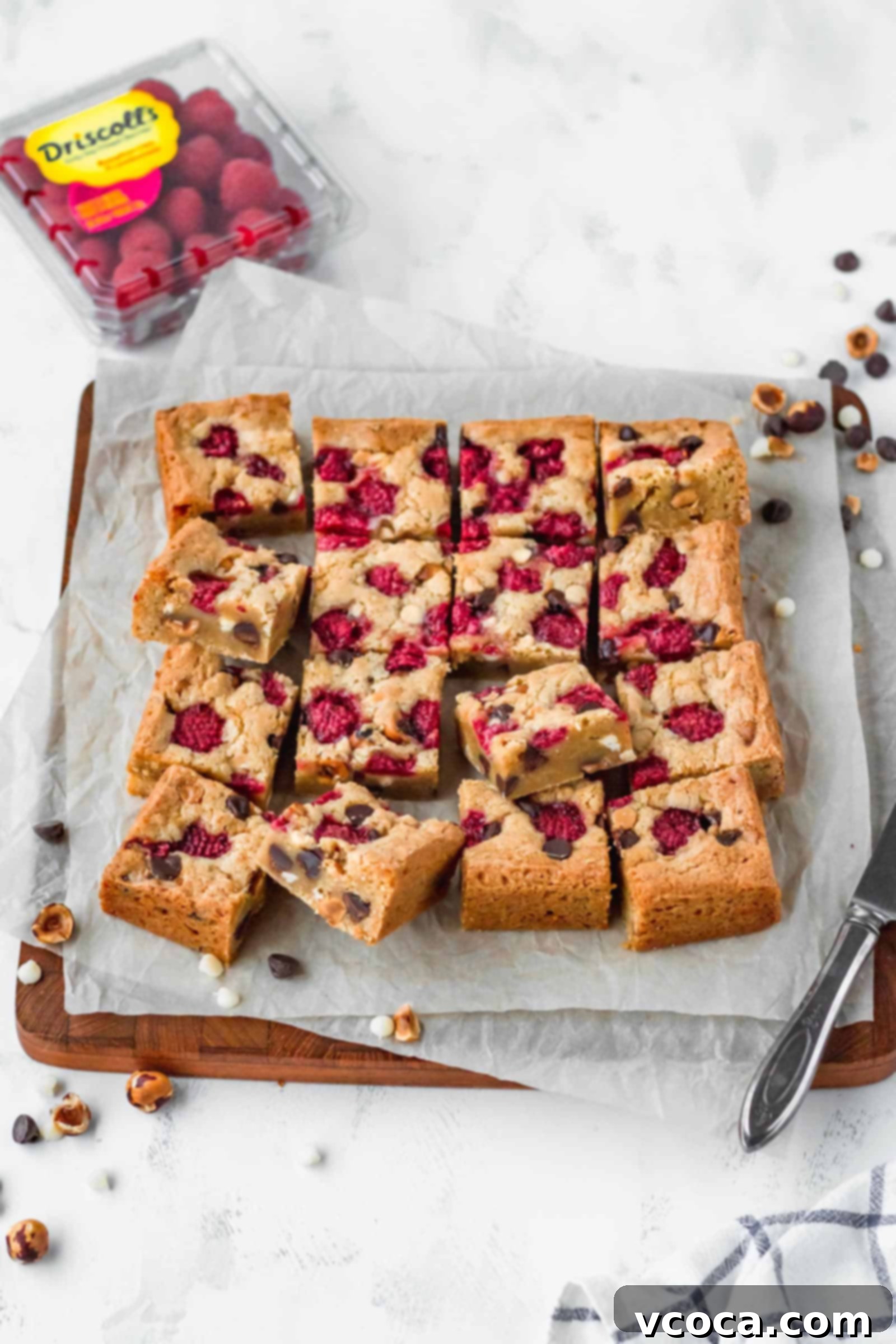 Raspberry hazelnut blondies with semisweet chocolate chips and white chocolate chips