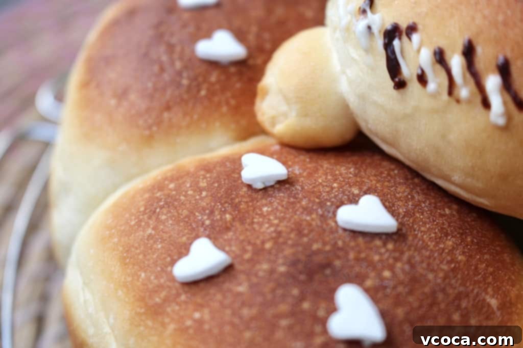 Cream Cheese & Blueberry Sweet Rolls 11 Blueberry Cream Cheese Buns with 'dad's face' bun and heart sprinkles