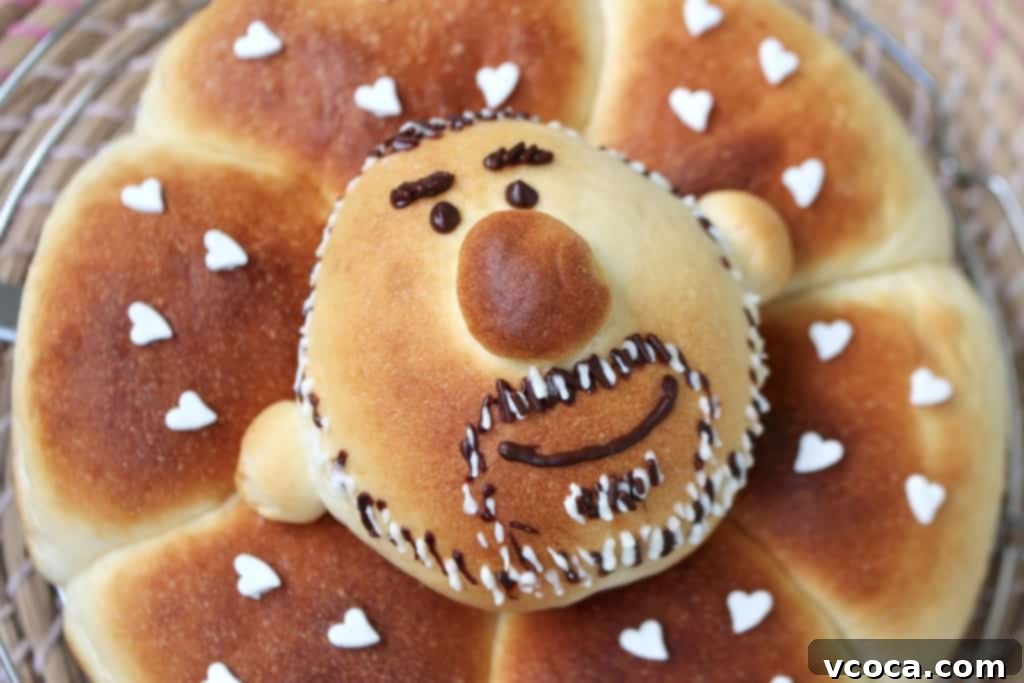 Cream Cheese & Blueberry Sweet Rolls 9 Decorating the 'dad's face' bun with melted dark chocolate