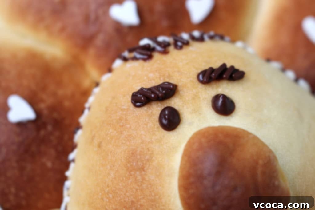 Cream Cheese & Blueberry Sweet Rolls 10 Adding chocolate jimmies to the 'dad's face' bun for a bushy beard effect