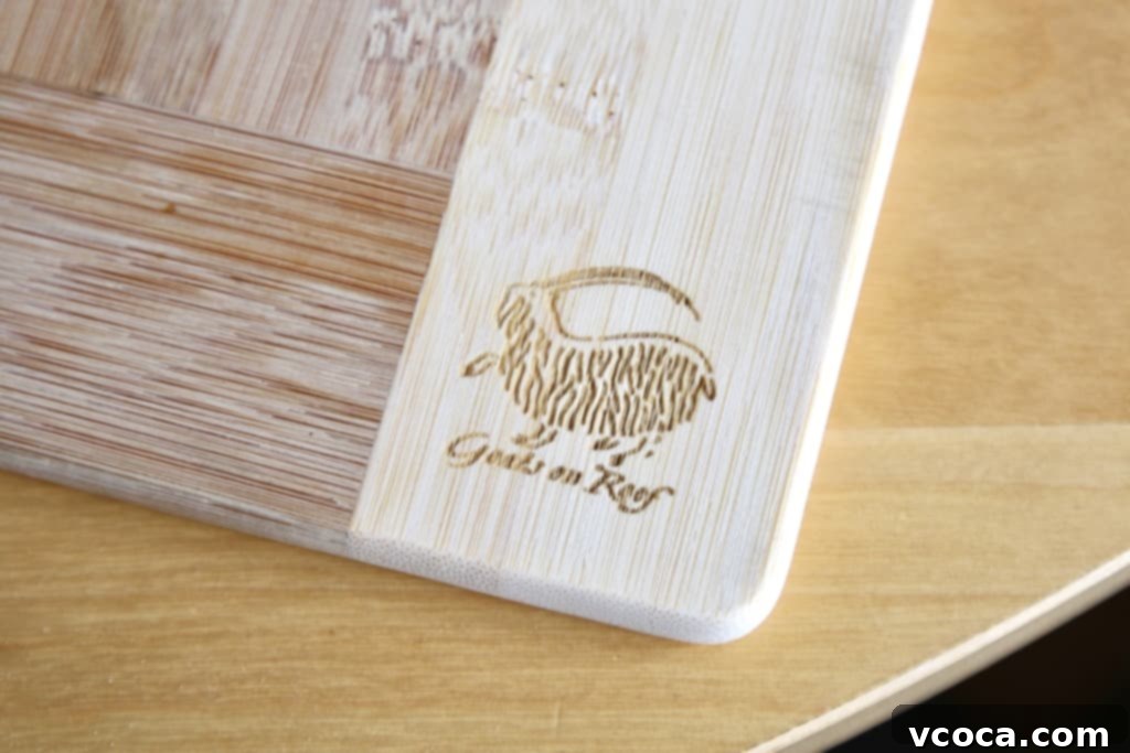 Moose Tracks Indulgence Muffins 6 Moose Tracks Muffin displayed on a charming mini bamboo cutting board from Coombs, Canada.