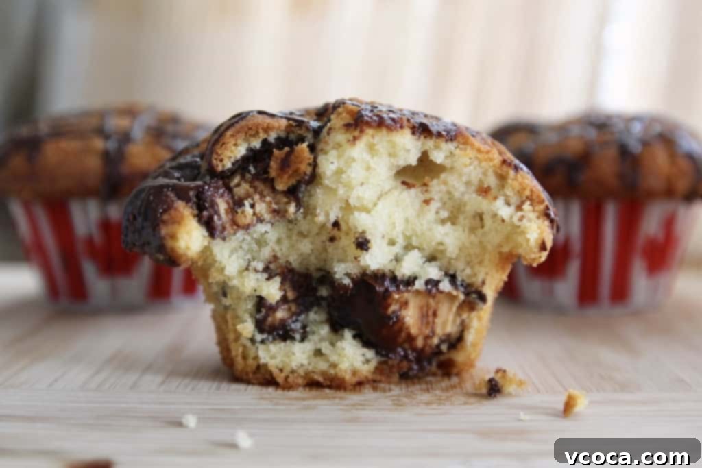 Moose Tracks Indulgence Muffins 8 Pile of warm Moose Tracks Peanut Butter Cup Muffins, a perfect treat.