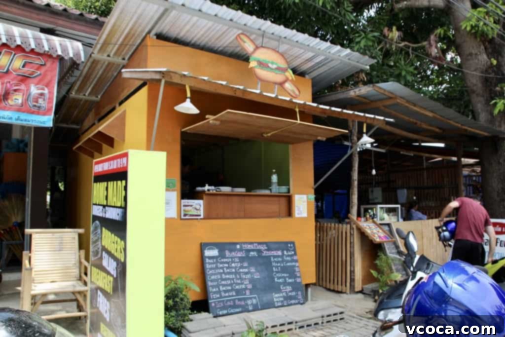 Our Koh Samui Honeymoon Delivered More Than Memories 14 The sign for 'Homemade Burgers and Sandwiches' restaurant in Koh Samui, Thailand.