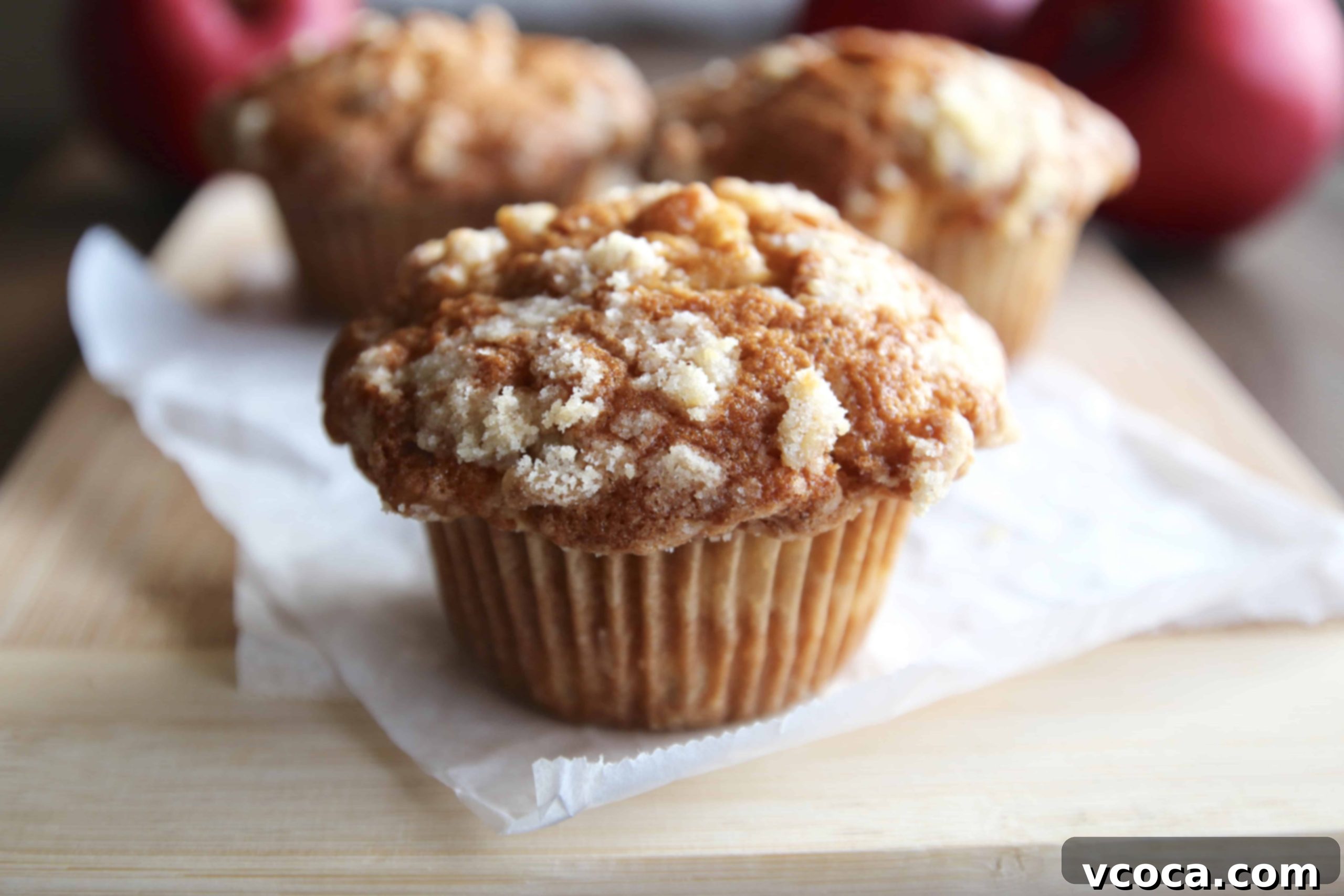 Apple Streusel Muffins 4 Apple muffin on parchment paper