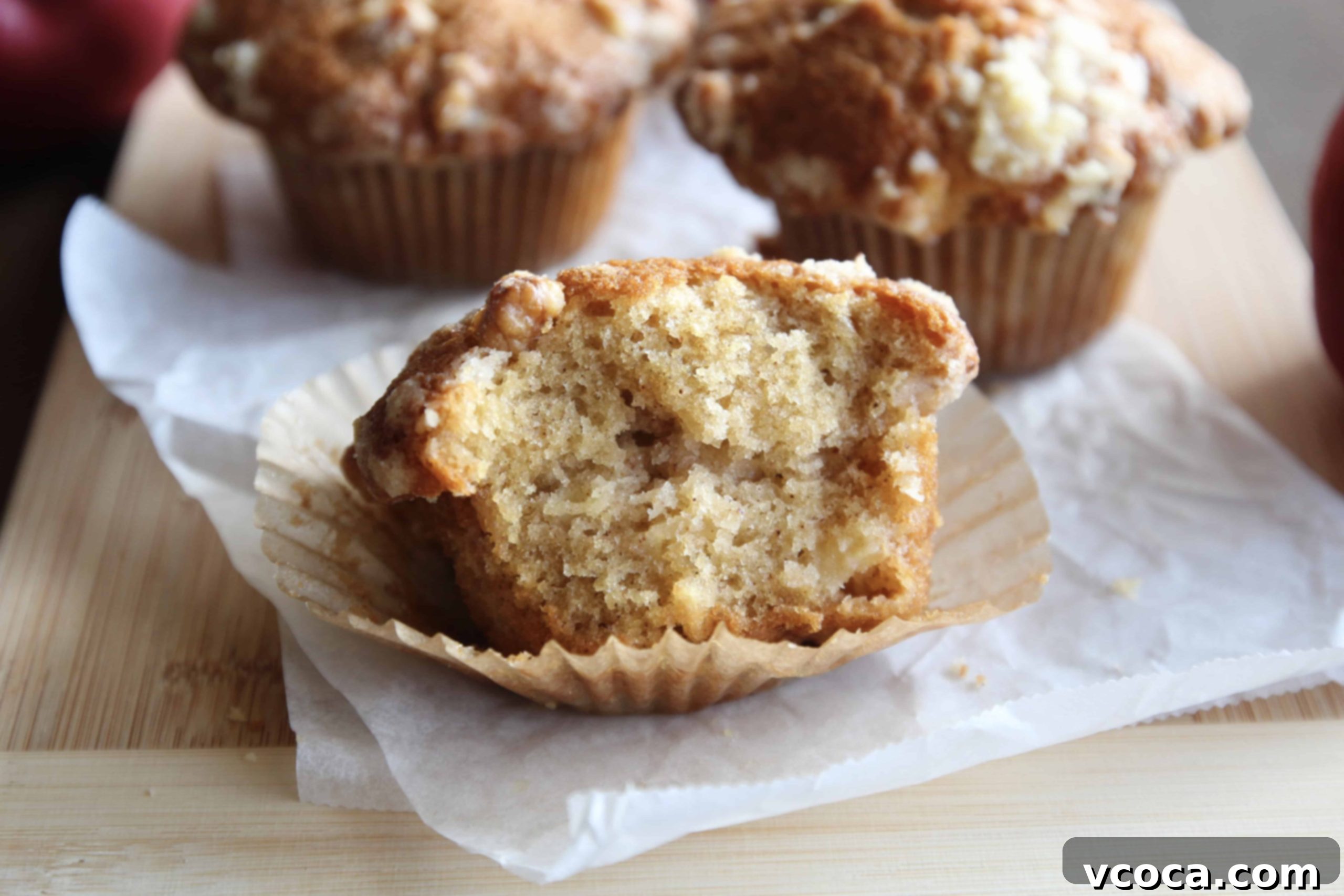 Apple Streusel Muffins 6 A bitten apple crumble muffin