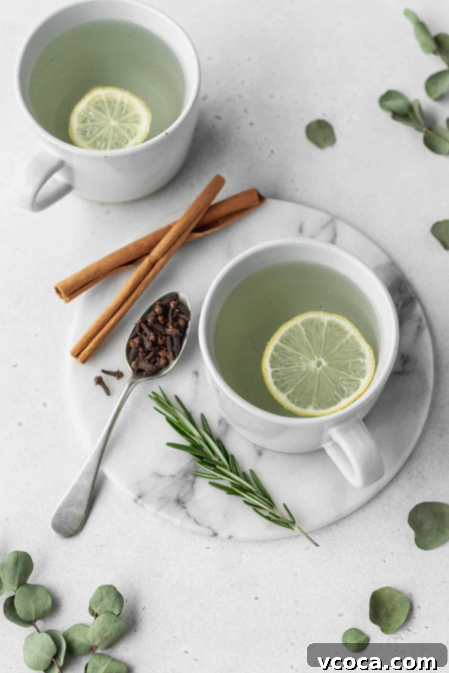 Thieves tea garnished with a fresh slice of lemon, ready to be enjoyed