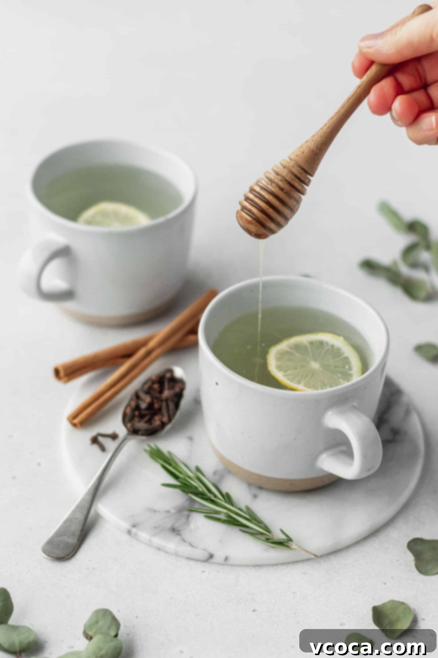 Thieves tea with a rich drizzle of honey, emphasizing its natural sweetness