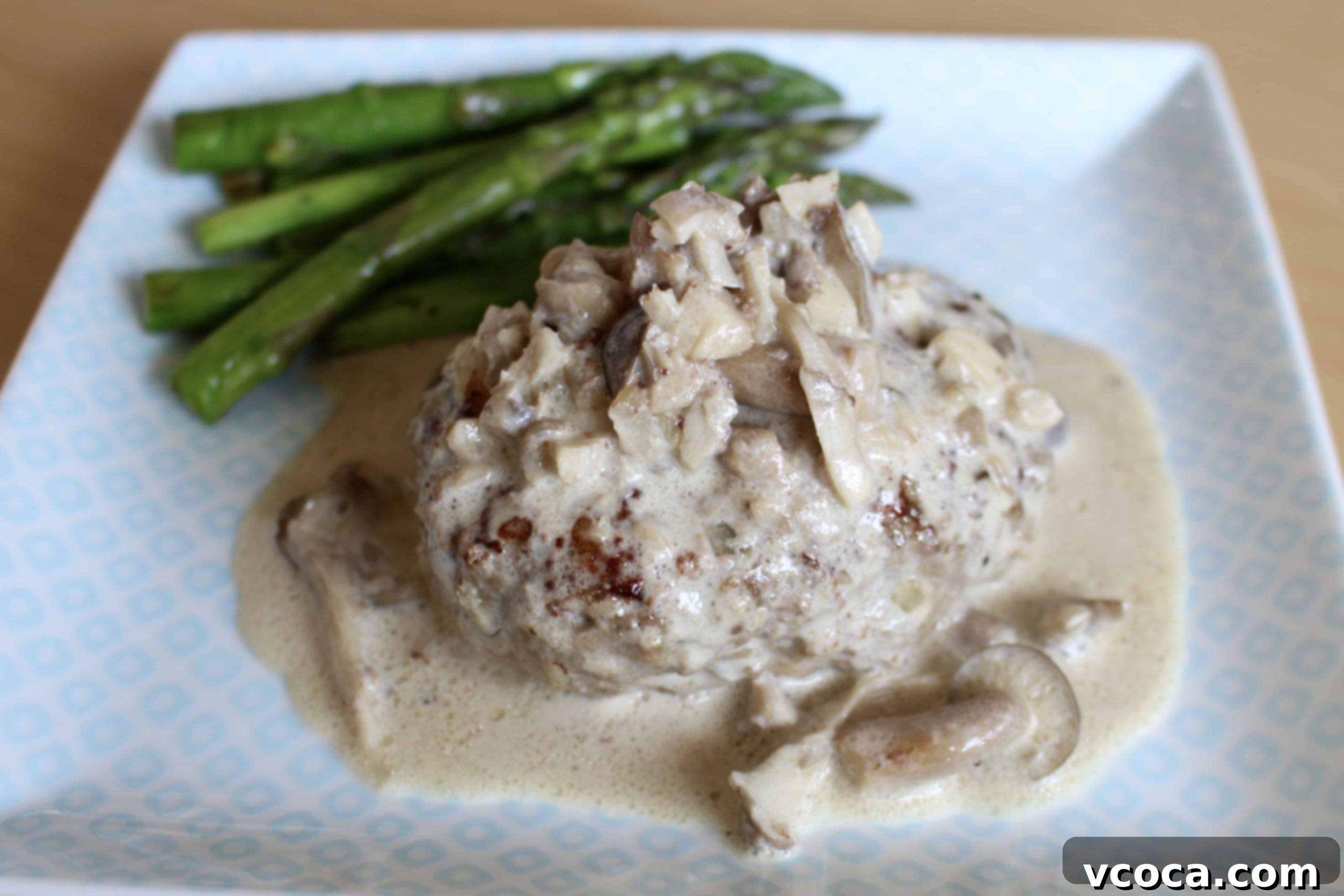 Creamy Mushroom Salisbury Steak 2 Delicious Salisbury steak with creamy mushroom sauce served on a plate