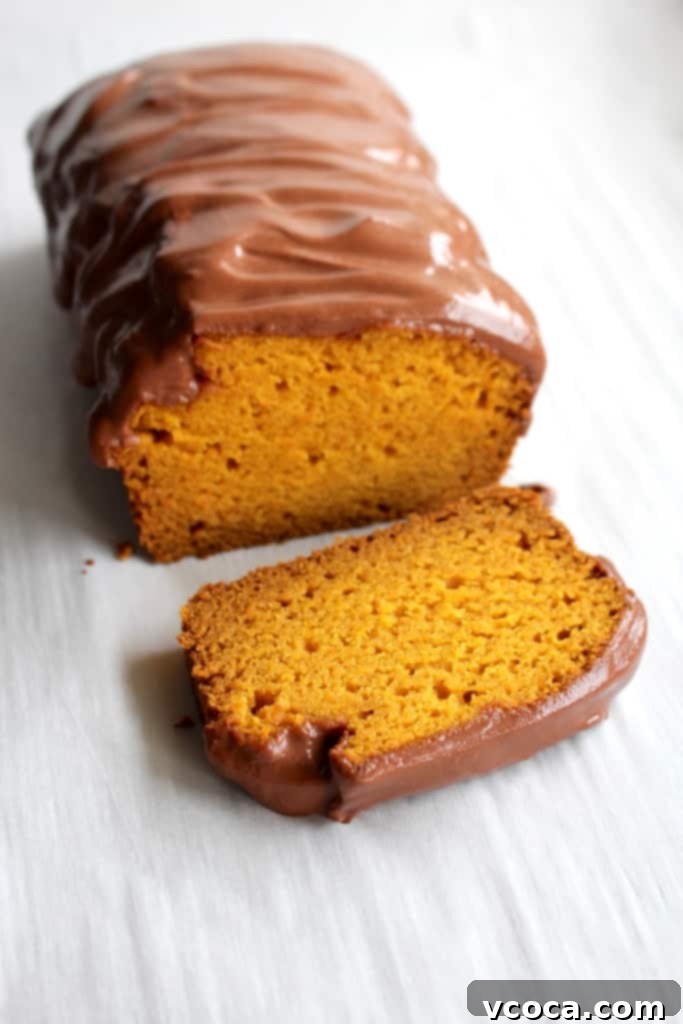 Brigadeiro Carrot Cake 6 Carrot loaf perfect for Easter! Inspired by the Brazilian bolo de cenoura, this cake uses puréed carrots and covered it in a chocolate frosting!