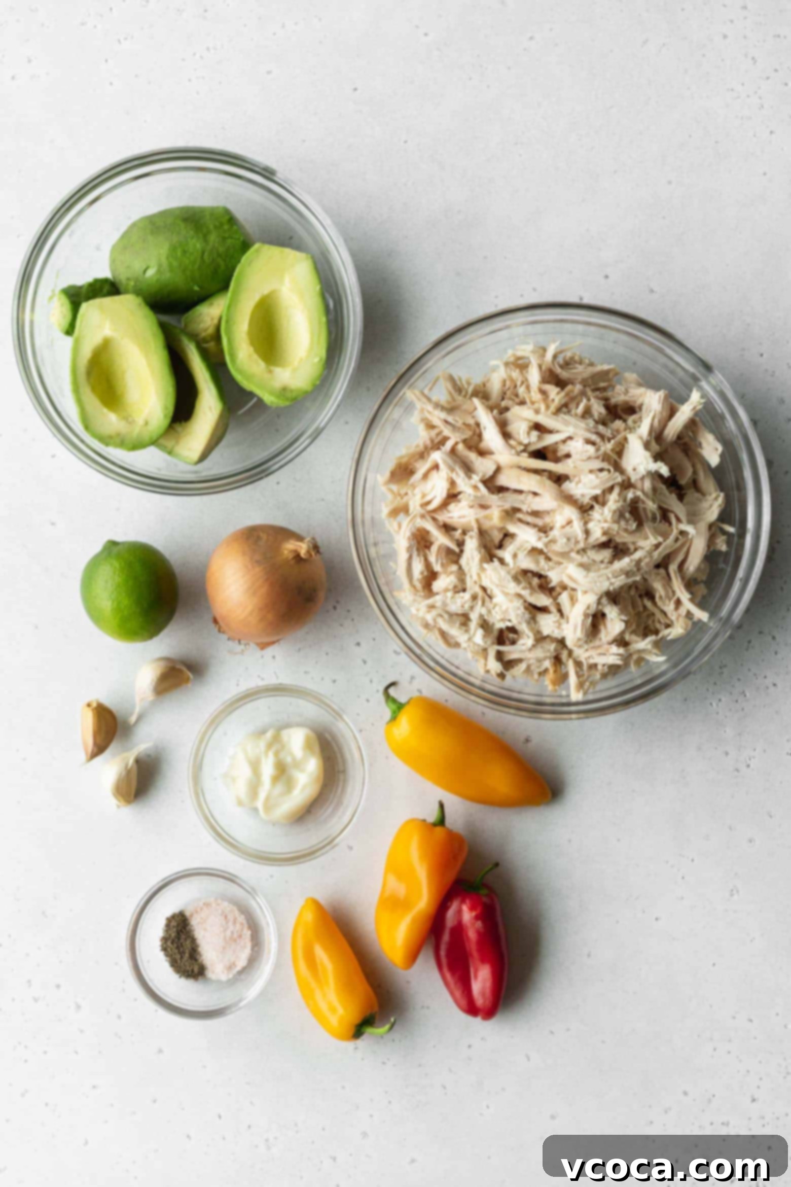 Reina Pepiada Venezuelan Arepas 4 Individual ingredients for the chicken and avocado filling, neatly arranged in small bowls