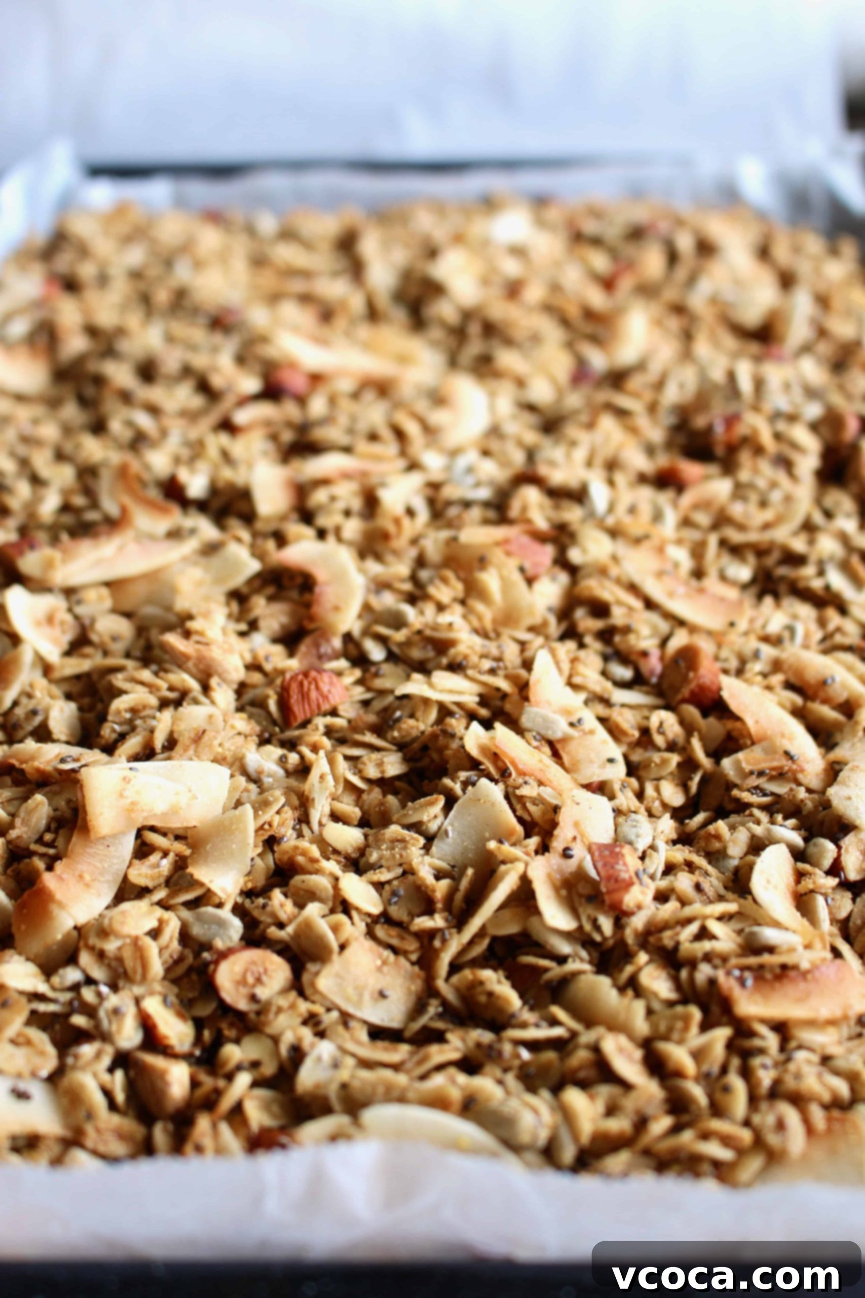 Seriously Delicious Gluten-Free Granola 7 Baked gluten-free granola on a baking sheet.