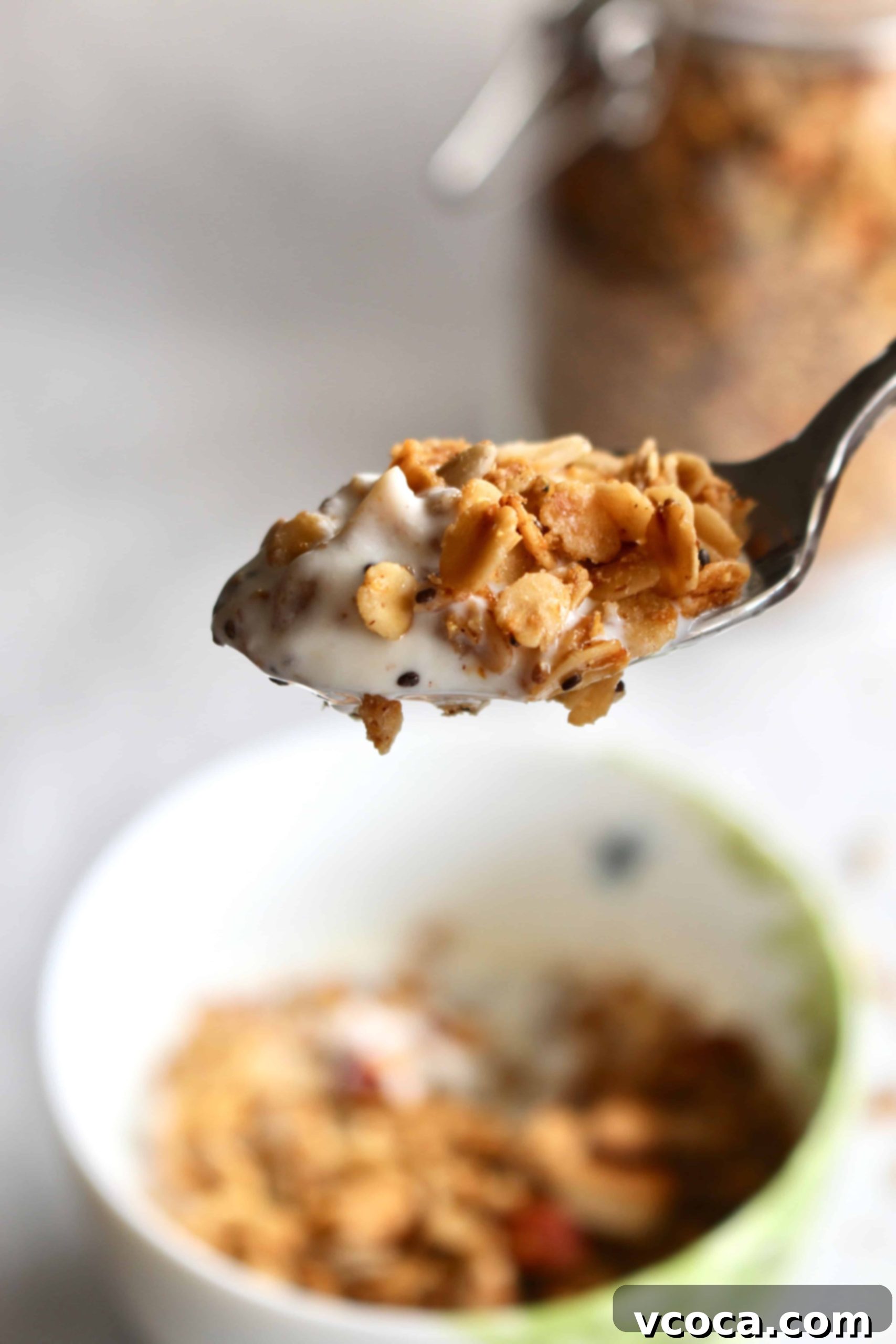 Seriously Delicious Gluten-Free Granola 9 A spoonful of homemade granola and yogurt.