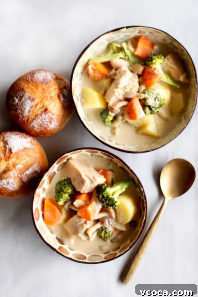 Vegan Japanese Cream Stew with Jackfruit 3 A close-up of a bubbling pot of Vegan Japanese Cream Stew, showcasing the vibrant vegetables and creamy texture before serving, highlighting its rich and inviting appearance.