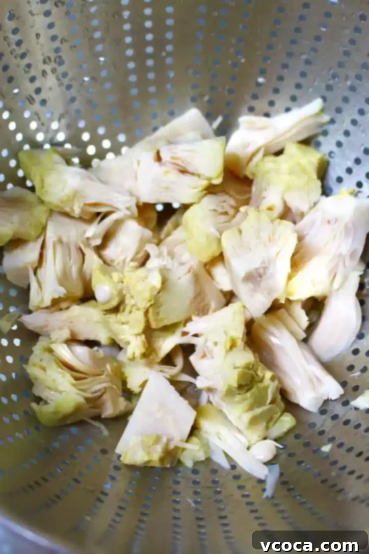 Vegan Japanese Cream Stew with Jackfruit 6 Nature's Charm young green jackfruit, thoroughly drained and squeezed, showing its shredded, meat-like texture, ready to be added to the stew.