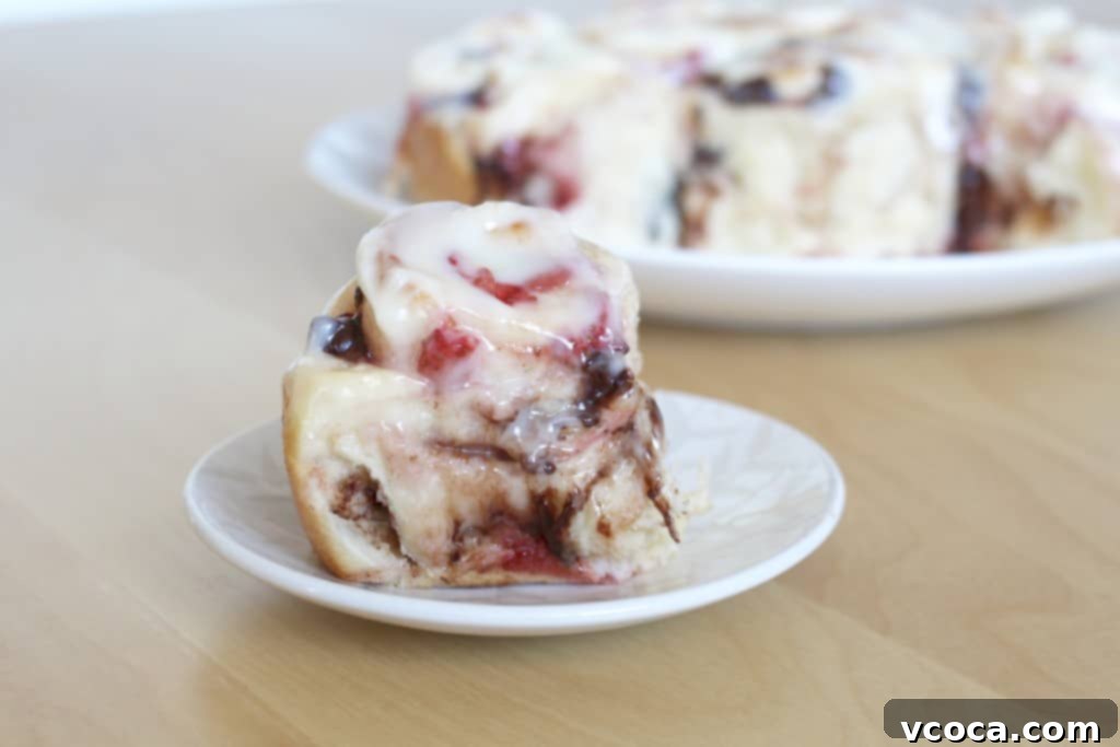 Decadent Strawberry Chocolate Rolls 9 Warm strawberry chocolate rolls topped with cream cheese frosting
