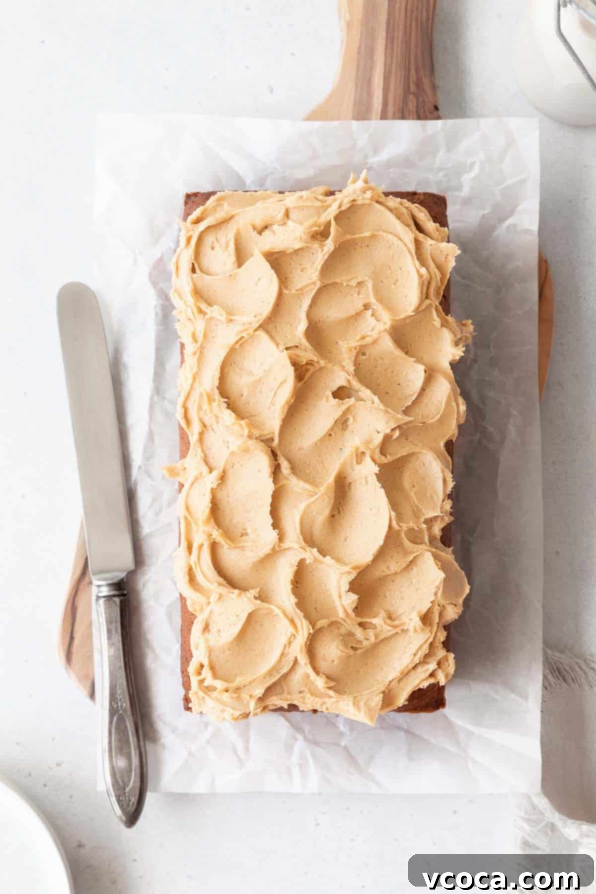 Spiced Sweet Potato Cake with Cashew Frosting 18 A frosted loaf of sweet potato cake.