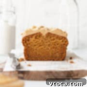 Spiced Sweet Potato Cake with Cashew Frosting 21 A square image of a sweet potato cake with cashew frosting.