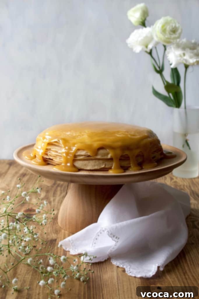 Golden Vegan Dulce de Leche Mille Crepe Cake 7 A perfectly cooked vegan crepe cooling on a wire rack, ready to be layered into the crepe cake.
