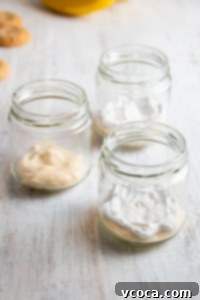 Custard and whipped cream in a jar.