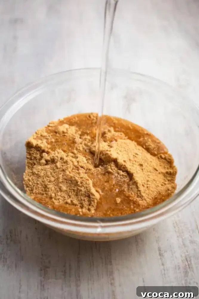 No-Bake Vegan Key Lime Bliss 4 Mixing graham cracker crumbs with coconut oil for pie crust