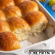 Pani Popo Samoan Sweet Coconut Buns 4 Pani popo in a white baking dish.