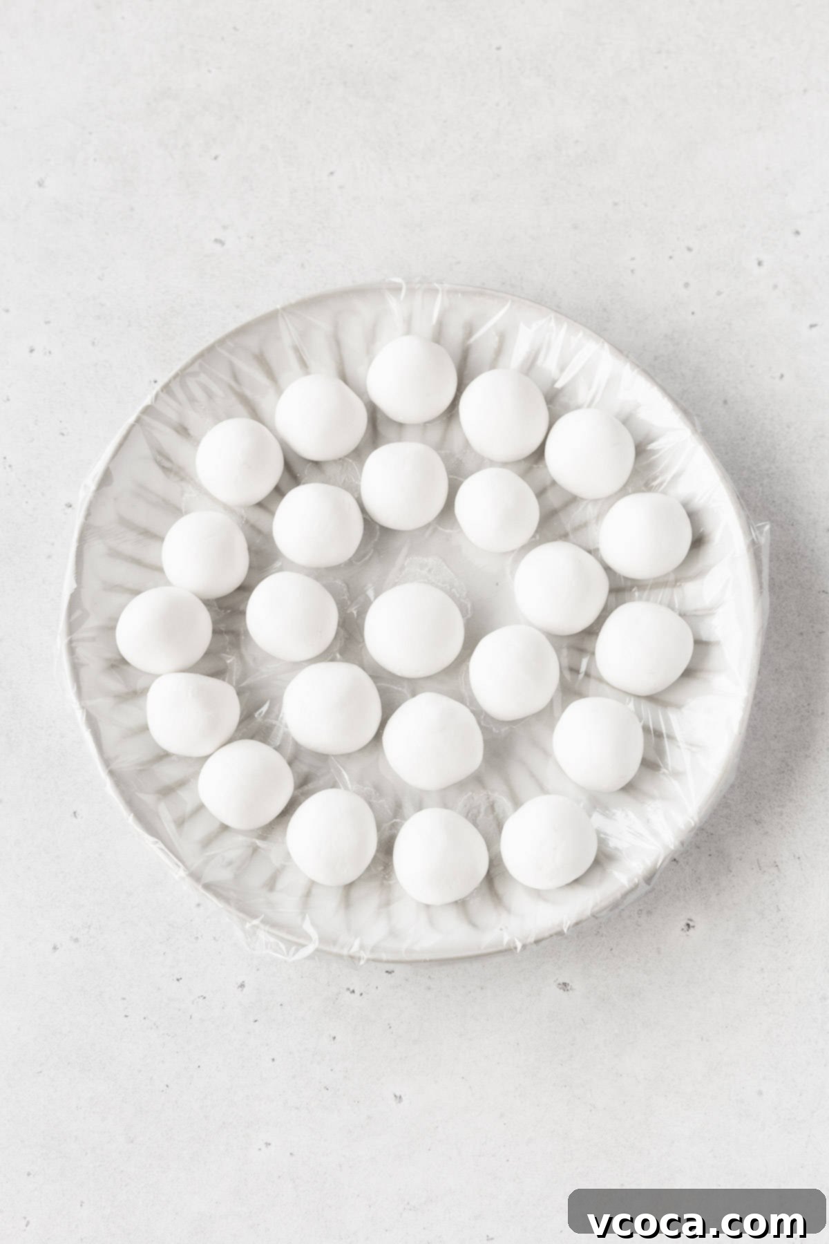 Pearl Rice Dumplings 10 A plate with small balls of shiratama dough.