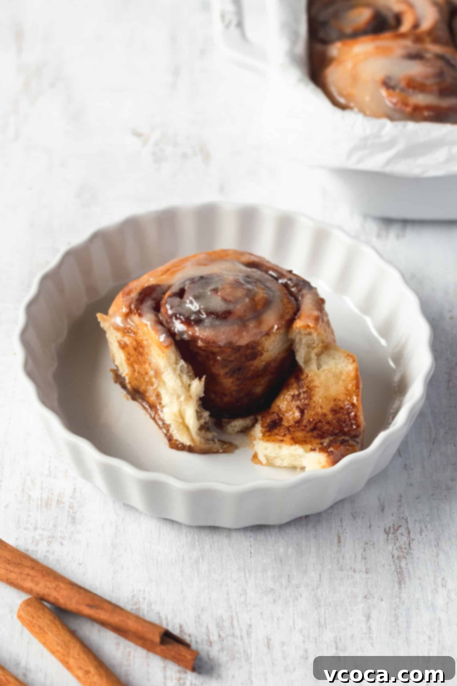 Pillowy Vegan Cinnamon Rolls with Dreamy Cashew Cream Frosting 10 Fluffy vegan cinnamon rolls topped with cashew cream cheese icing, served fresh