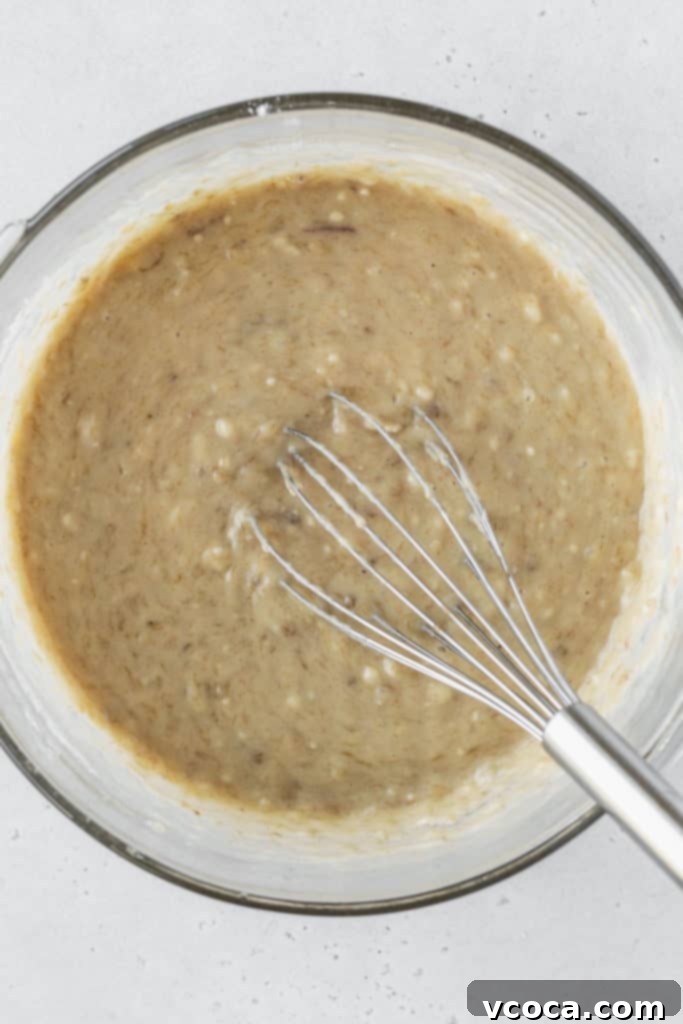 Smooth, light banana cupcake batter, ready for baking.