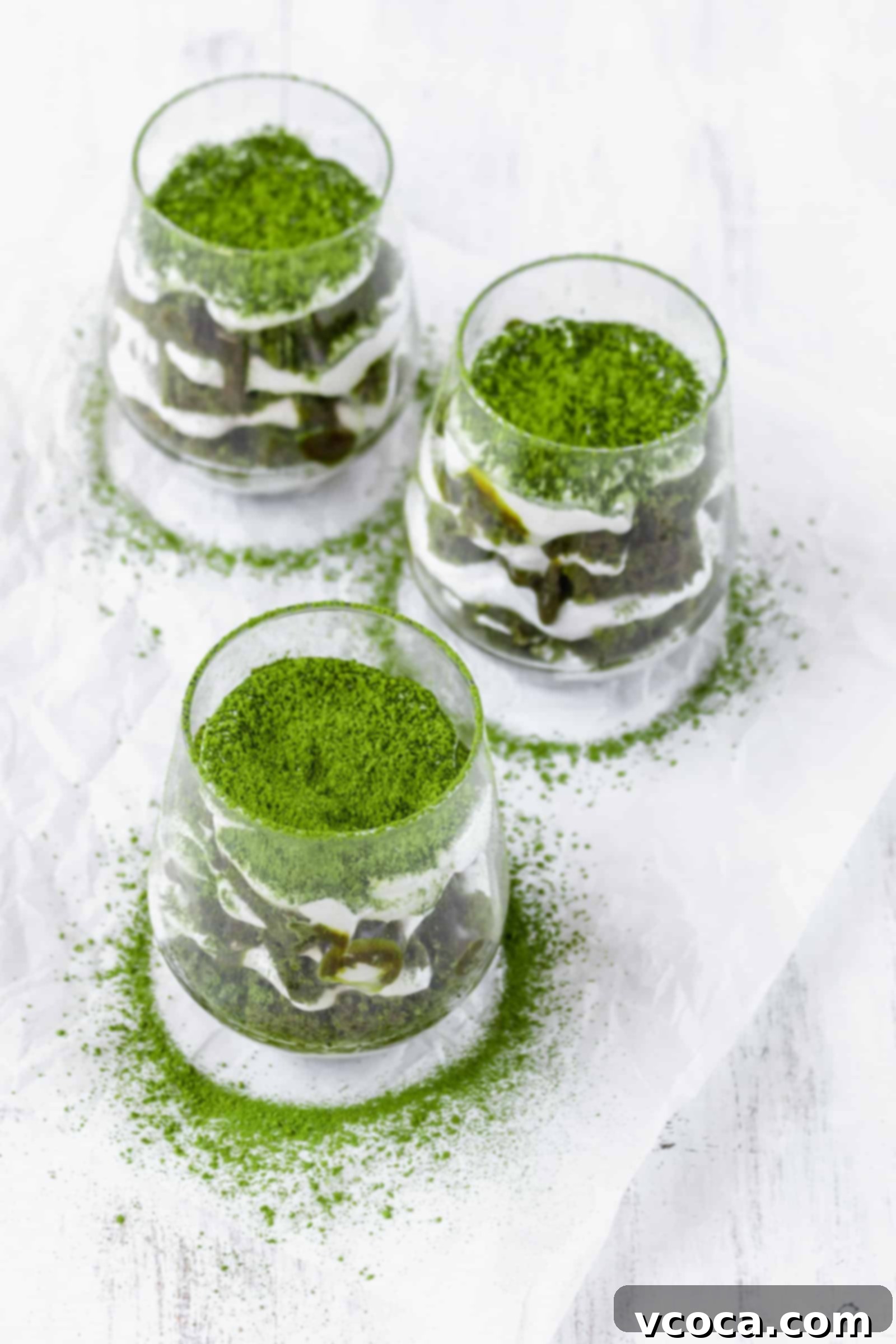 Effortless Plant-Based Matcha Tiramisu 5 A top-down view of an assembled Vegan Matcha Tiramisu, ready for chilling, highlighting the neat layers of cake and cream.