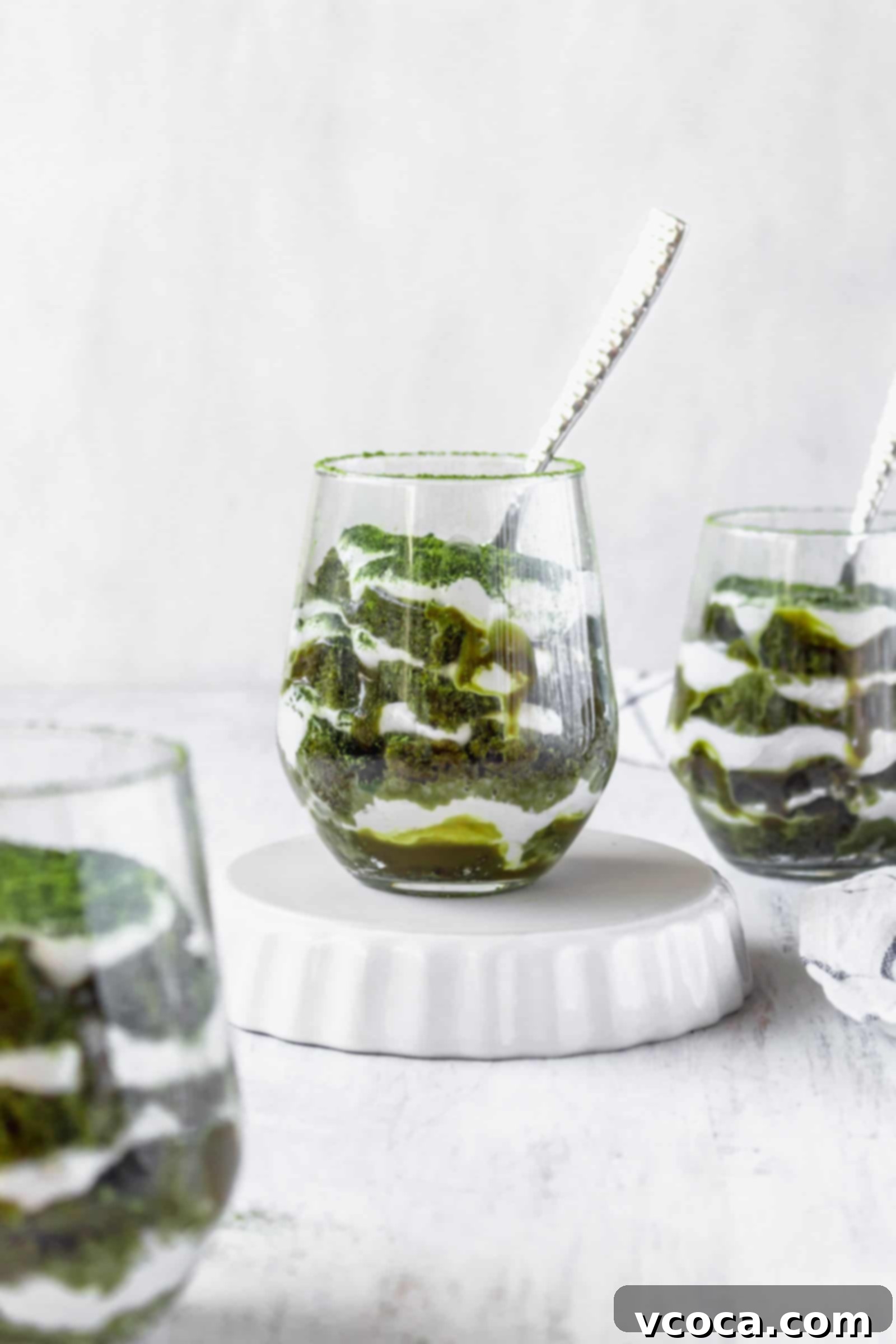 Effortless Plant-Based Matcha Tiramisu 9 Vegan matcha tiramisu, a Japanese-Italian fusion dessert with layers of matcha cake, matcha sauce, and coconut whipped cream.