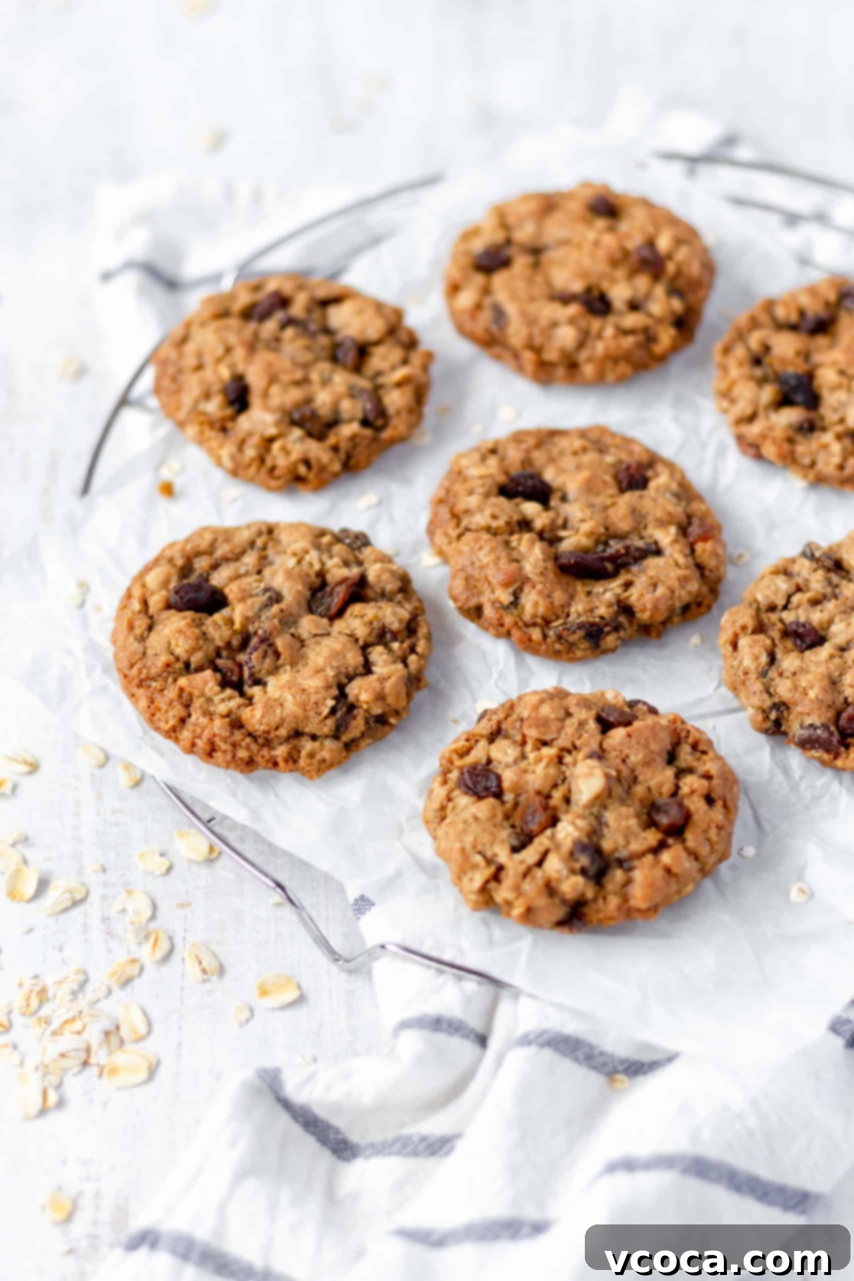 Chewy Brown Butter Oatmeal Raisin Cookies 5 Raw oatmeal cookie dough with raisins scooped onto a baking sheet