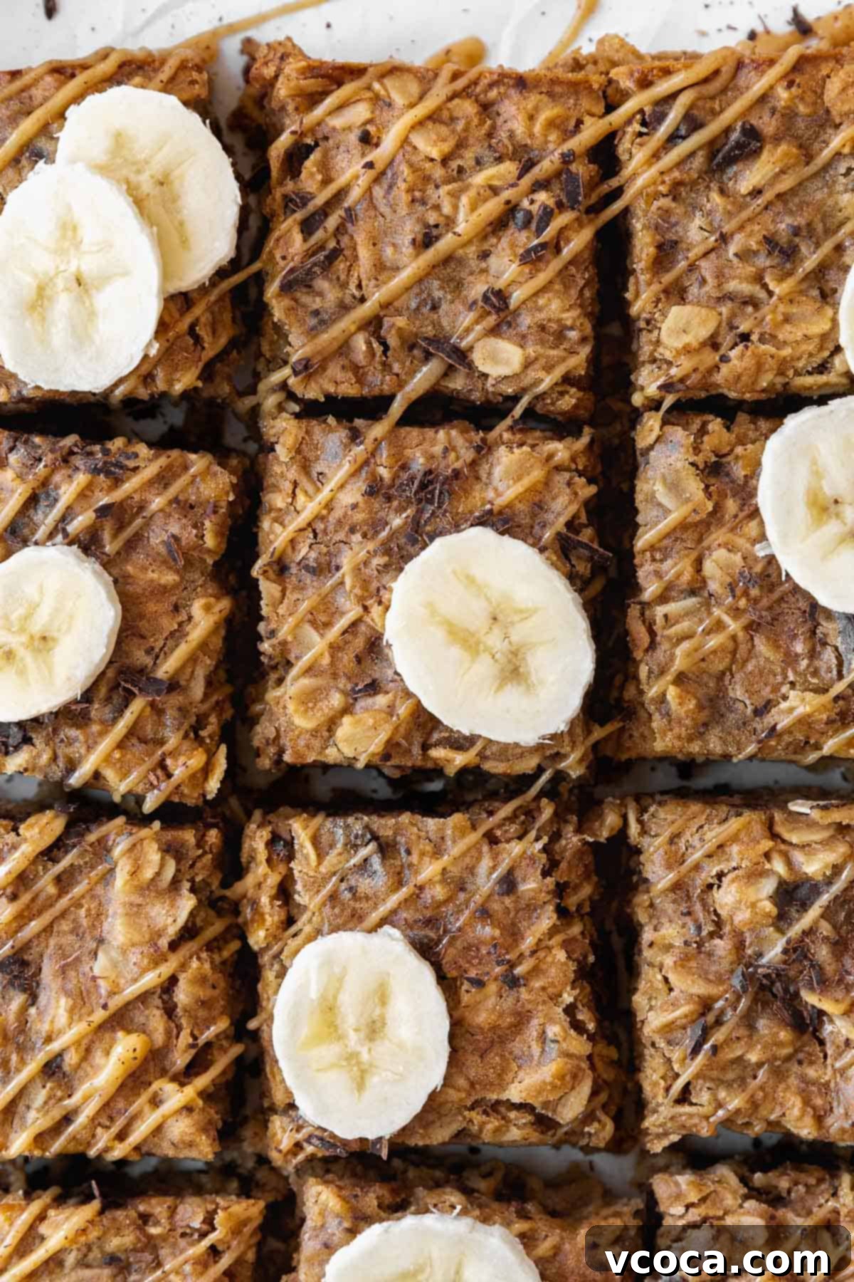 Gluten Free Peanut Butter Oatmeal Breakfast Bars 13 An overhead shot of sliced peanut butter banana oatmeal bars.