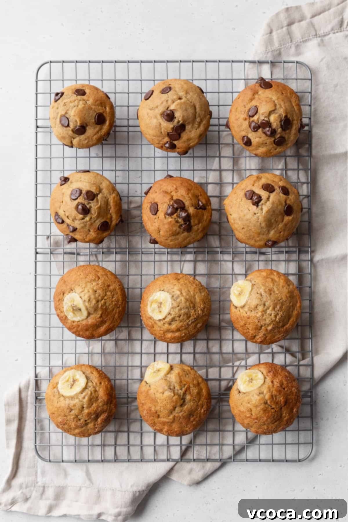 Irresistible Gluten-Free Banana Muffins 3 Twelve banana muffins cooling on a wire rack.