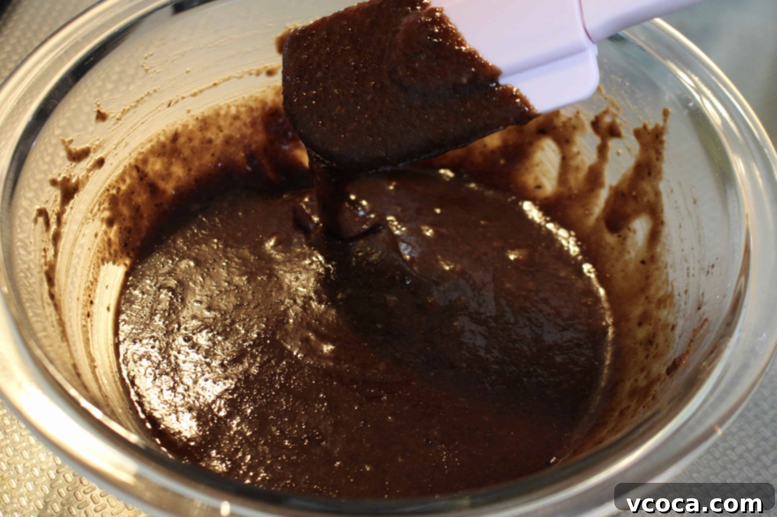 Decadent Chocolate Hazelnut Financiers 4 Whisking granulated sugar, hazelnut flour, cake flour, and cocoa powder for financiers.